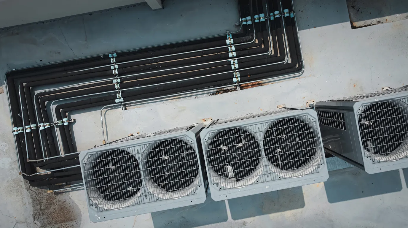 Top view of HVAC units on a roof.
