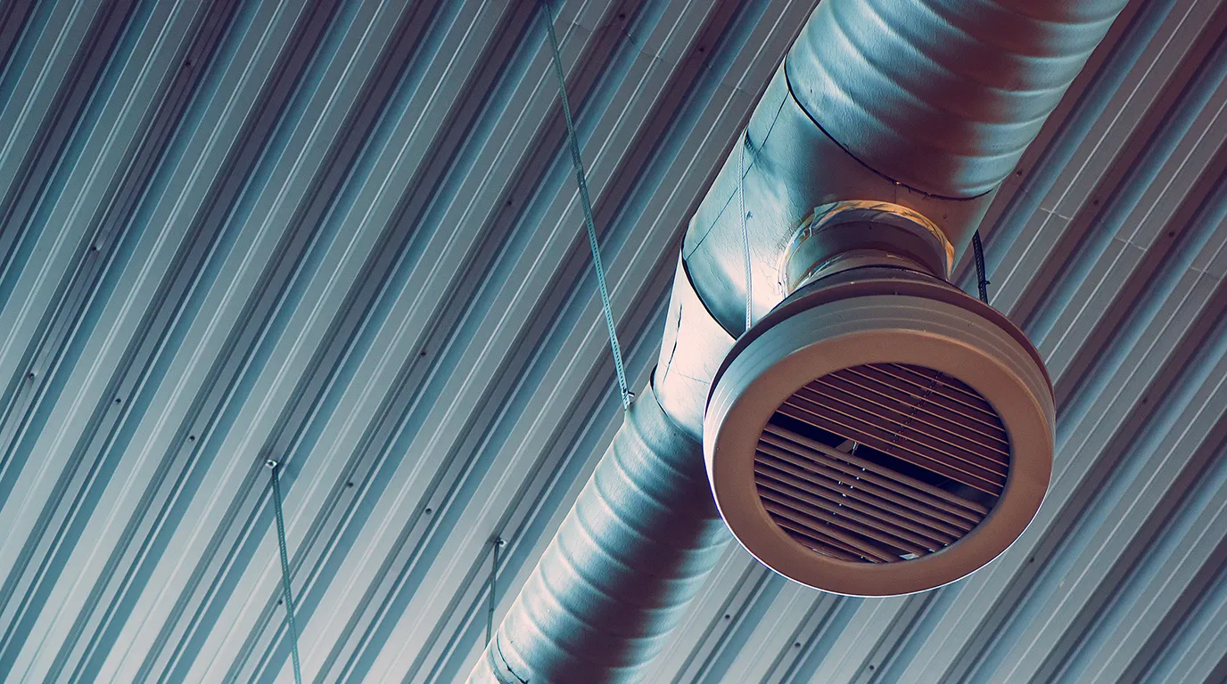vent system in industrial room showing airflow